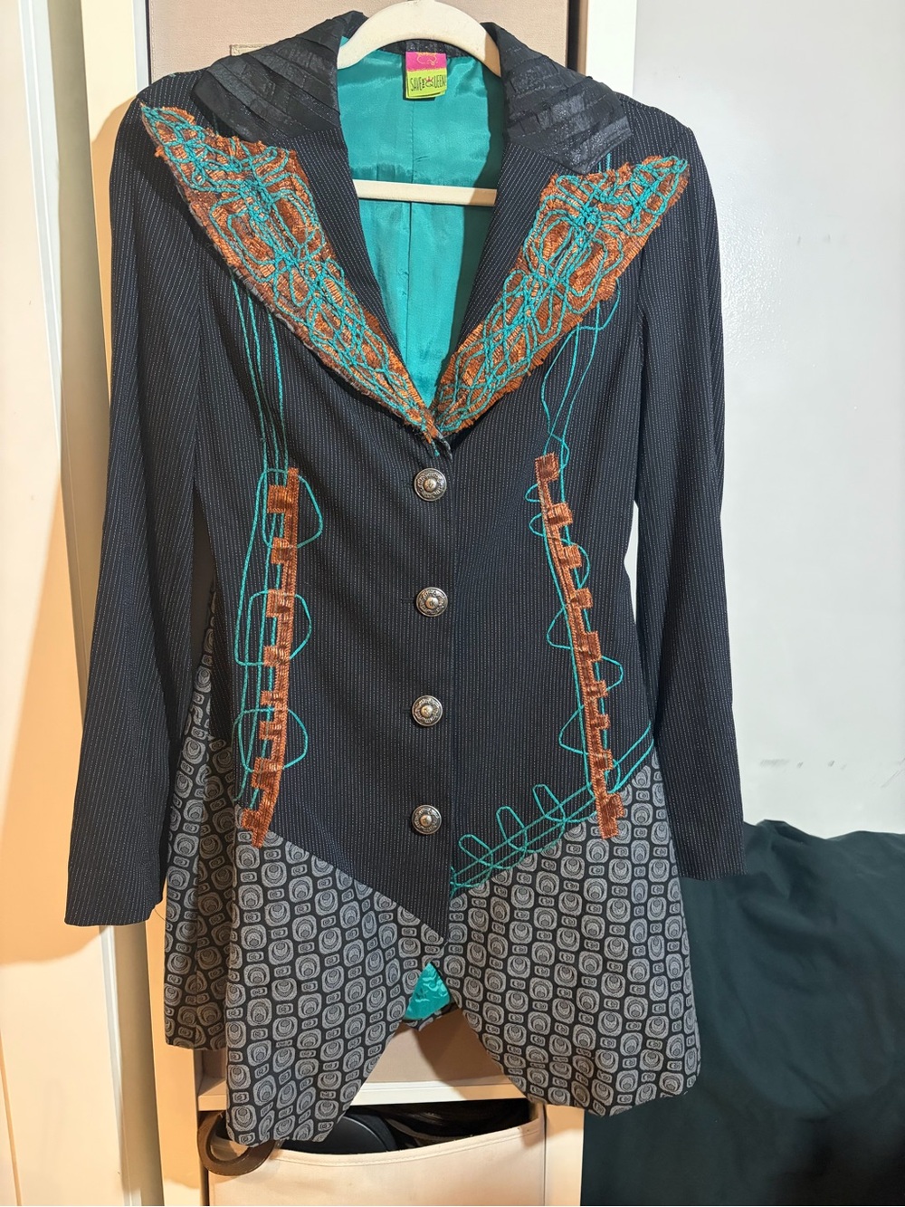 Save the Queen Women's Black Embroidered Statement Coat with Teal Lining